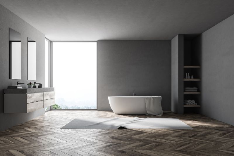 huge bathroom space with bath tub on the saide and vanity cabinet