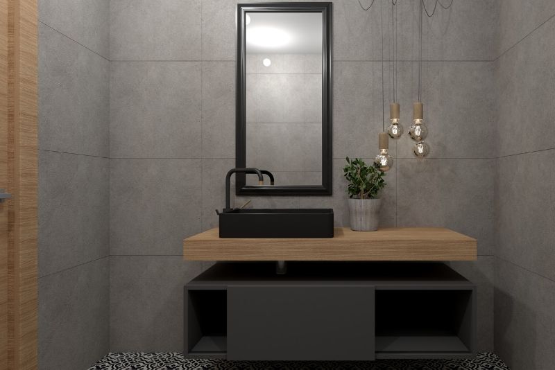 bathrooom vanity cabinet with black framed mirror and sink faucet and