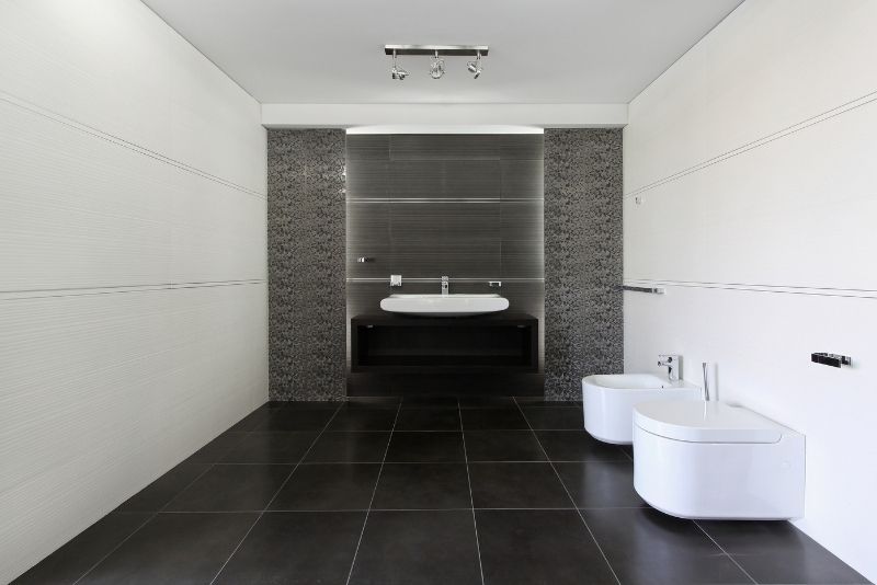 huge space bathroom renovations with vanity sink in the middlle